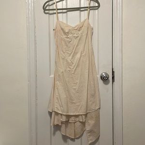 100% cotton cream dress made in Italy. Size Small. Bustier top with back cinch.